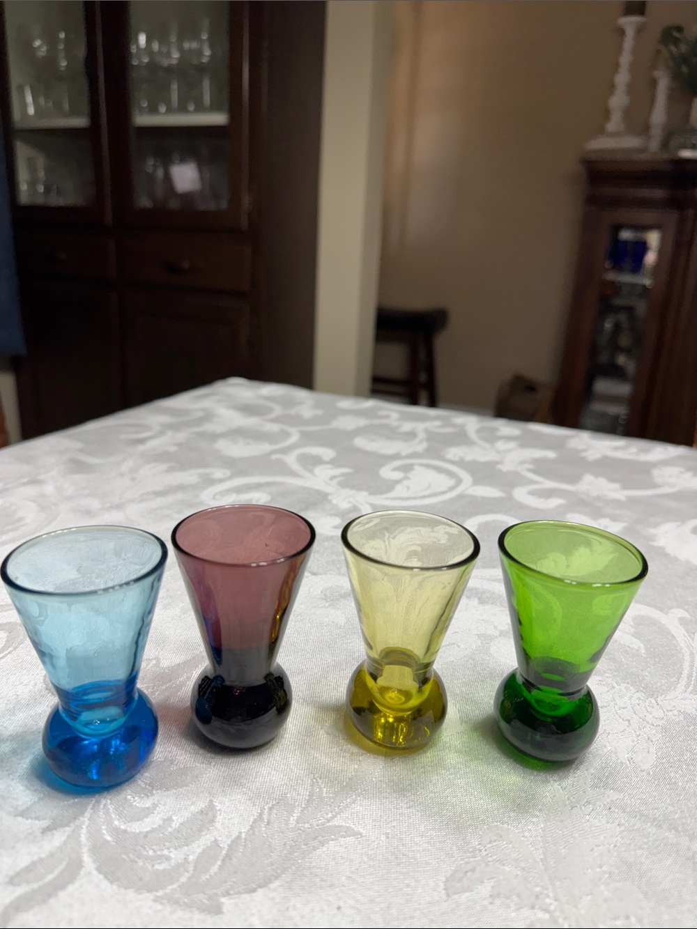 (4) MCM hand blown multi colored shot glasses.